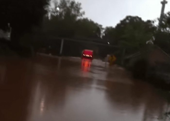 VIDEO: Truck Drives Through Flooded Road
