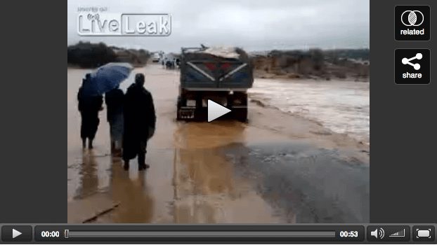 Truck Swept Away By Flood Waters