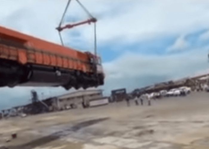 VIDEO: Crane Drops Train