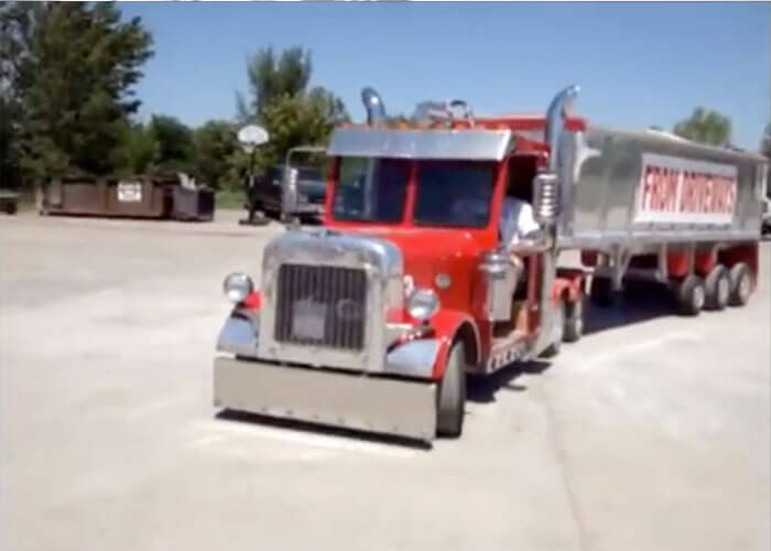 VIDEO: Custom Mini Peterbilt End Dump Truck Gets The Job Done