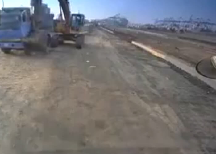 VIDEO: Excavator Destroys Truck