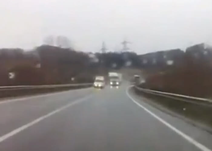 VIDEO: Amazing Car Driver Avoids Collision With Oncoming Lorry