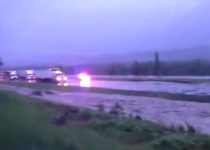 VIDEO: Flooding Covers Alberta Highway