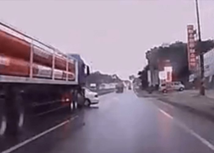 VIDEO: Car Drifts Into Truck’s Lane, Gets Taken For A Ride