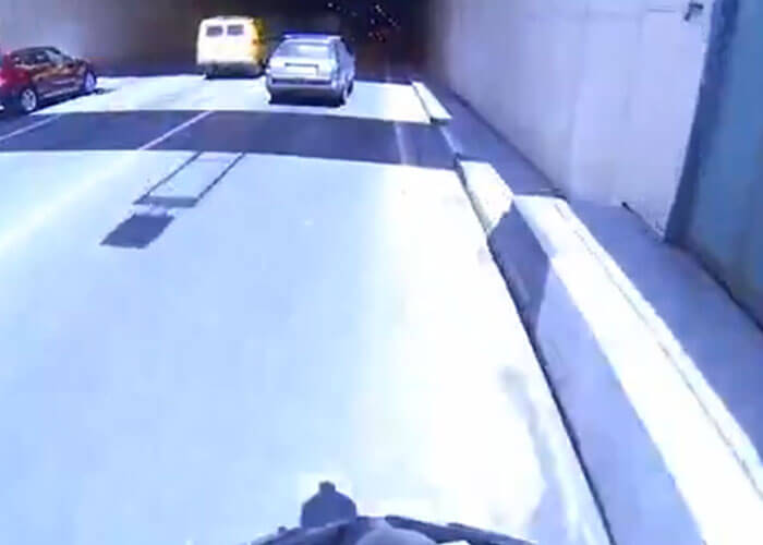 VIDEO: Bicyclist Rides Through Busy Tunnel