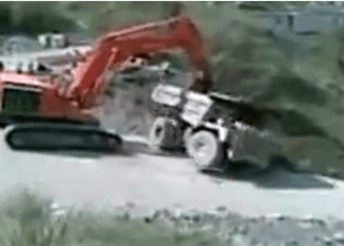 VIDEO: Epic Dump Truck Fail