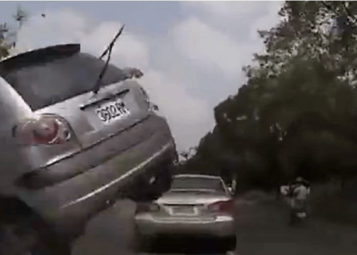 VIDEO: On-Coming Car Jumps Median