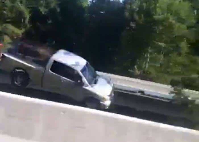 VIDEO: Pickup Flies Over Guardrail