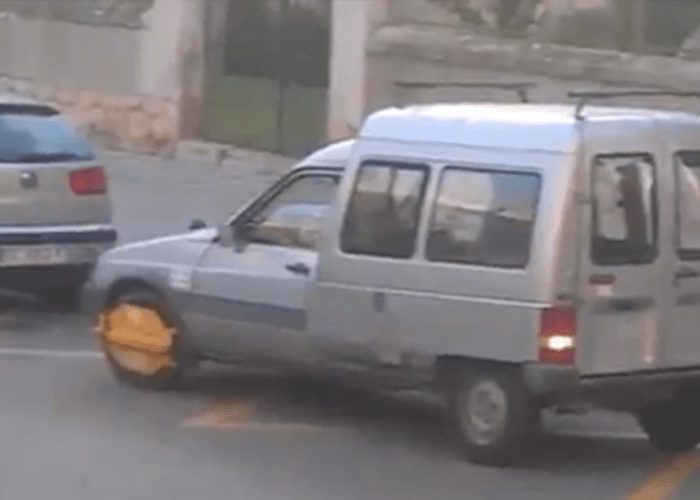 VIDEO: Unaware Driver Tries To Drive With Clamp On Wheel