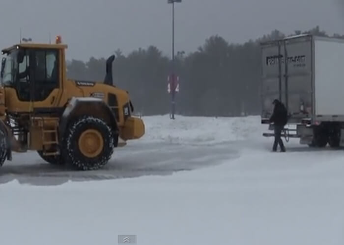 VIDEO: Loader Pulls Out Stuck Truck