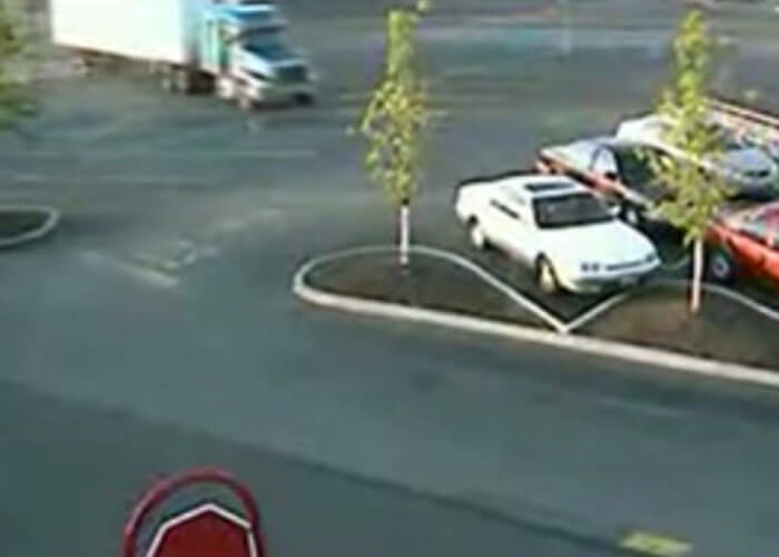 VIDEO: Rolling Truck Hits Parked Cars