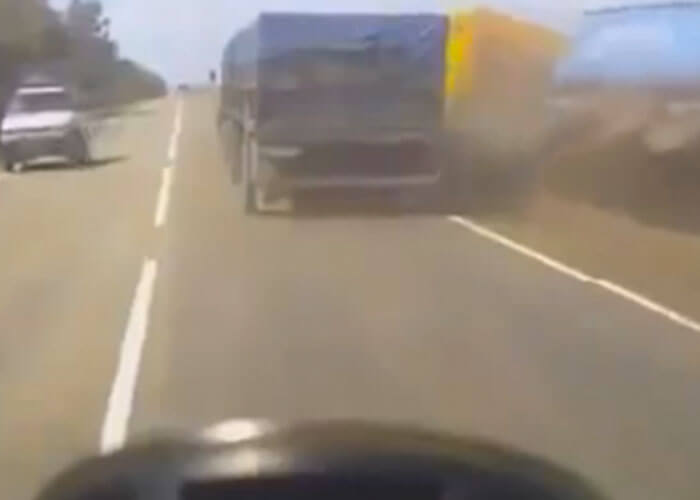 VIDEO: Truck Tips Into Ditch