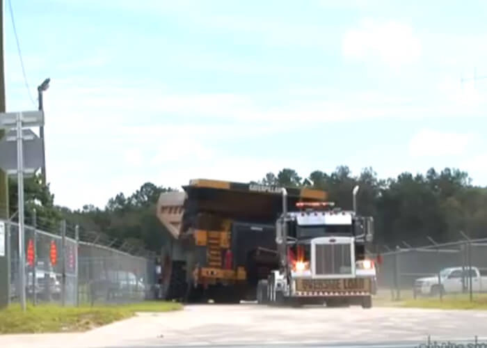 VIDEO: Cat 777 Mining Haul Truck Transportation By 11 Axle Lowboy