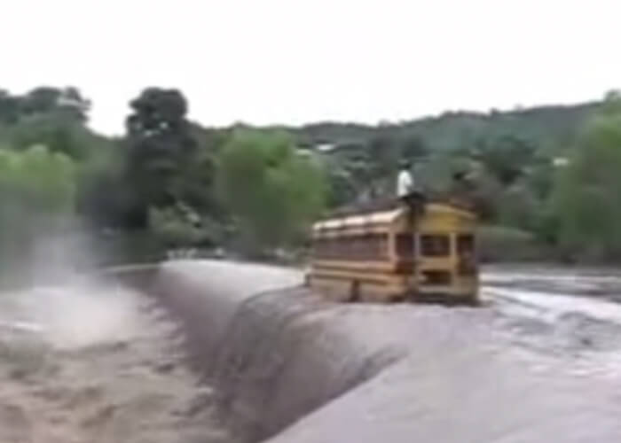 VIDEO: Insane Bus Driver Drives Over Waterfall