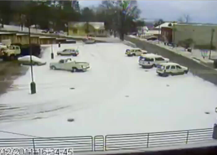 VIDEO: Snow Plow Falls Through Parking Garage Roof