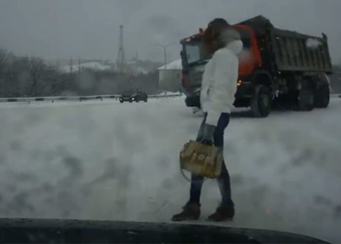VIDEO: Truck Tips In Front Of Pedestrian