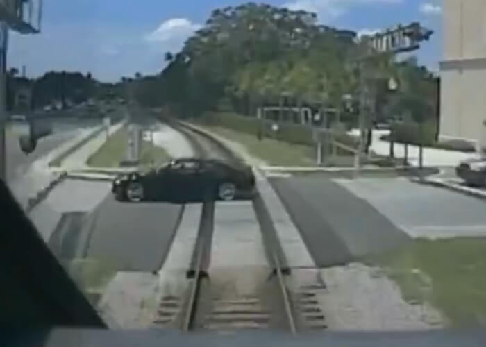 VIDEO: Woman Stalls New Car On Train Tracks