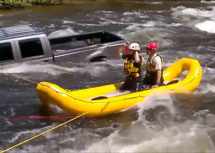 Video: Dog Rescued From Vehicle in Fast-Moving River