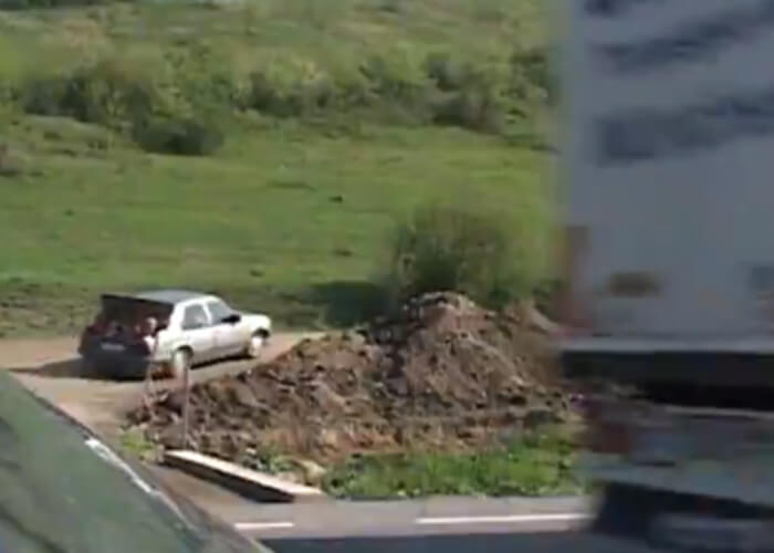 VIDEO: Kids In Trunk Of Car Almost Hit By Truck