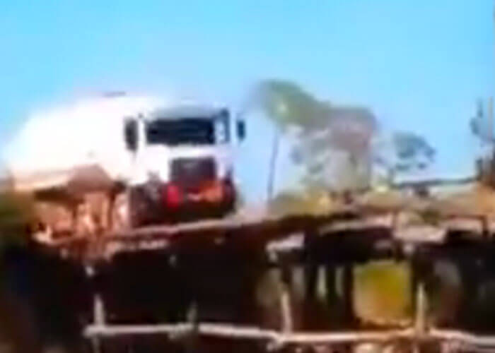 Video: Truck Goes Over Rickety Old Bridge