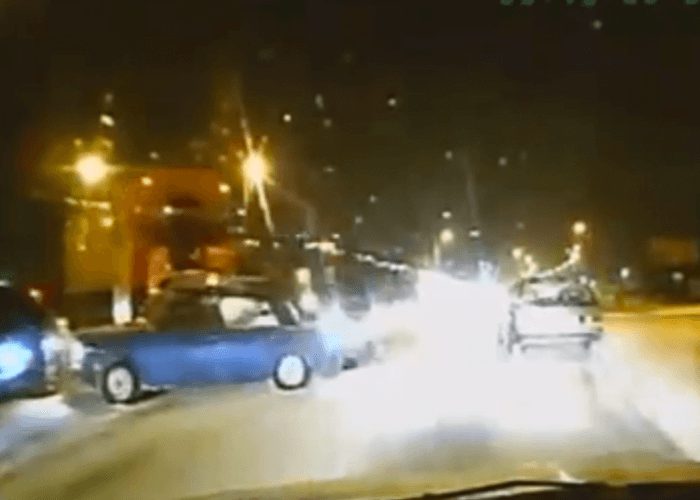 VIDEO: Russian Driver Takes Out Line Of Cars