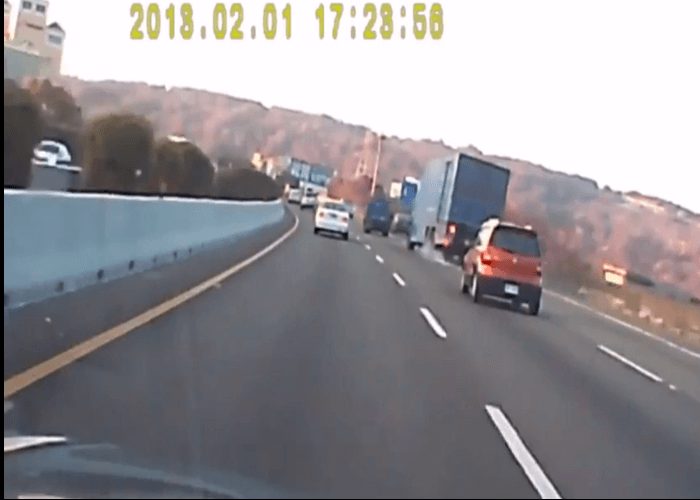 Video: Merging Driver Causes Truck to Roll