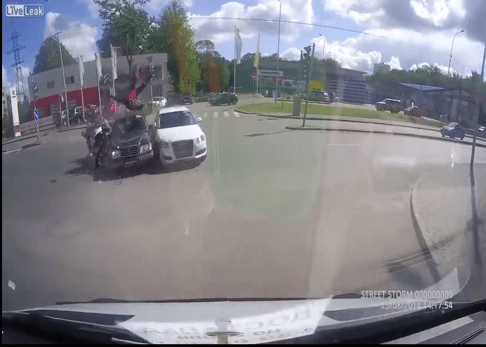 Video: Motorcyclist Survives Insane Crash