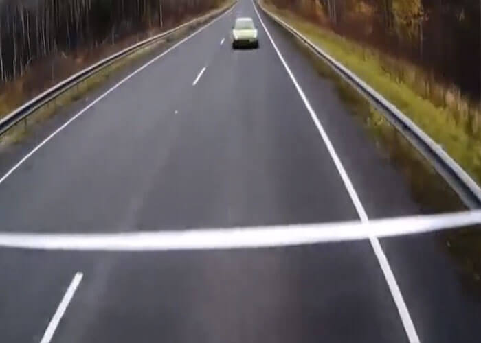 Video: Car Hits Truck Head-On