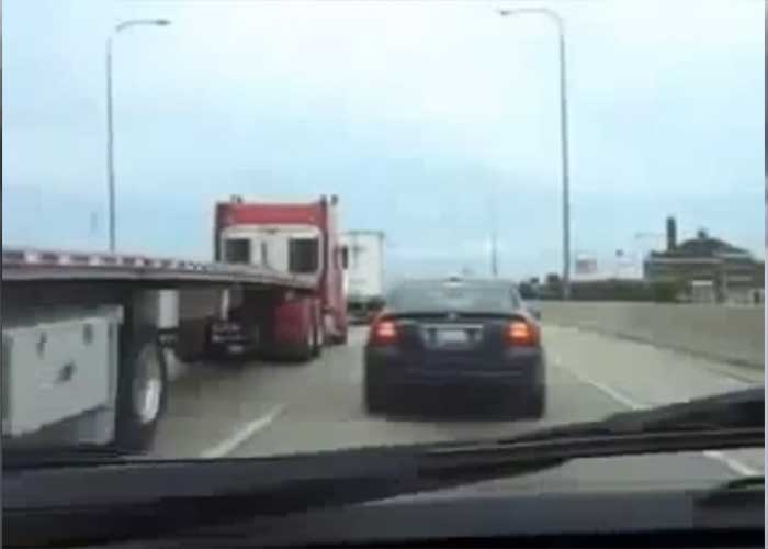 VIDEO: Car Gives Truck A Little Rub