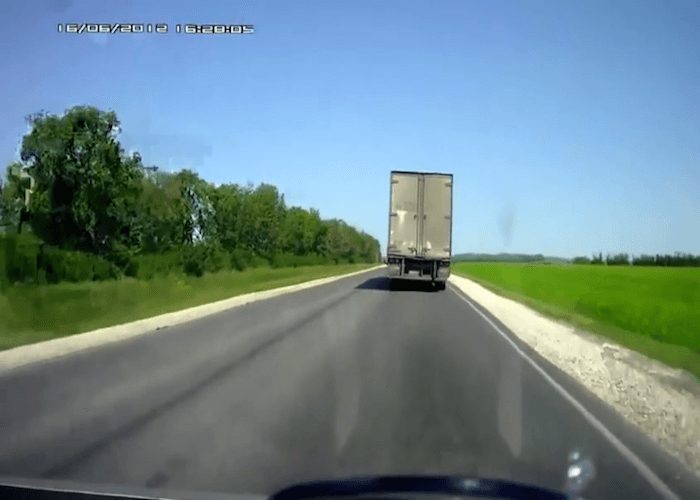 Video: Overtaking Car Collides with Oncoming Truck