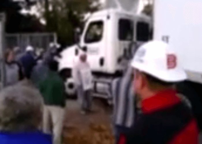 VIDEO: Truck Driver Takes On Picket Line