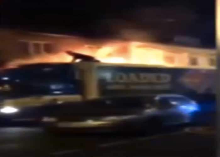 Video: Amazing Footage! Truck Driver Uses Truck To Save Man in Apartment Fire