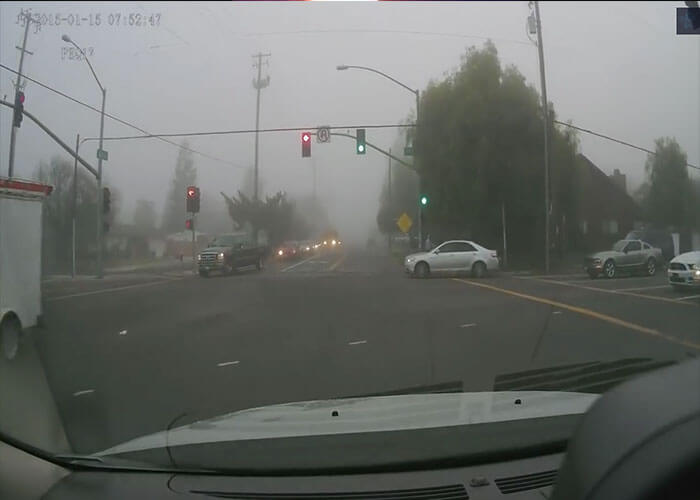 Video: Car Cuts Off Driver, Hits Parked Pickup Truck