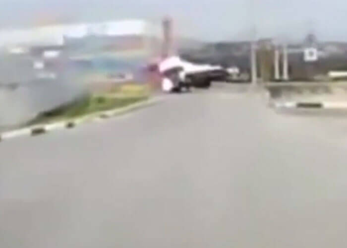 VIDEO: Truck Overturns With Heavy Load