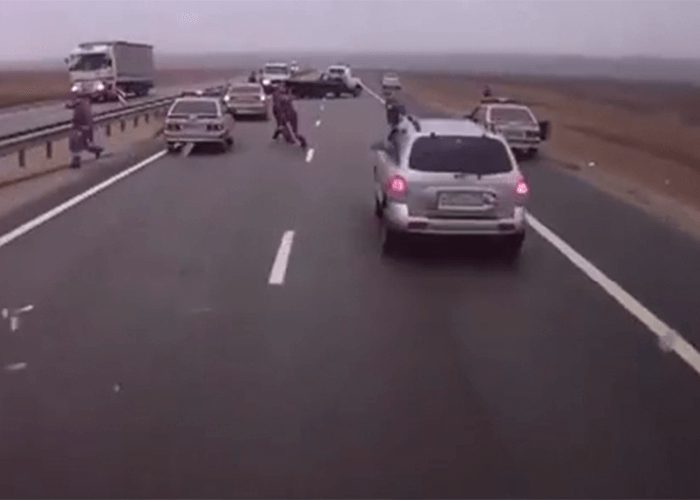 VIDEO: Distracted Truck Driver Zooms Through Accident Scene