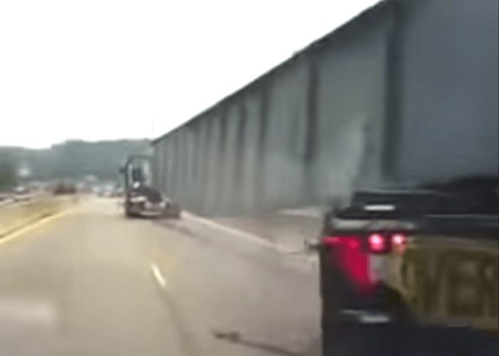 VIDEO: Truck Carrying Oversized Load Overturns