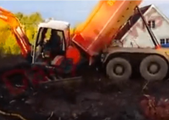 VIDEO: Truck Backs Into An Excavator