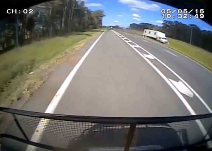 VIDEO: Truck Tire Blows Out, Driver Steers Truck Down Median
