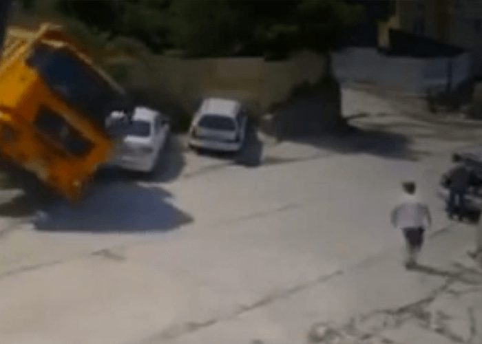 VIDEO: Out Of Control Gravel Truck Crushes Car Seconds After Driver Exits