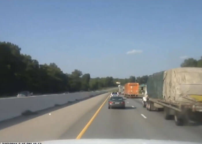 VIDEO: Trailer Tire Explodes, Bumper Flies At Truck