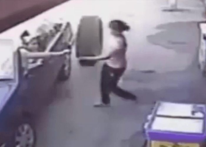 VIDEO: Truck Tire Misses Lady By Millimeters
