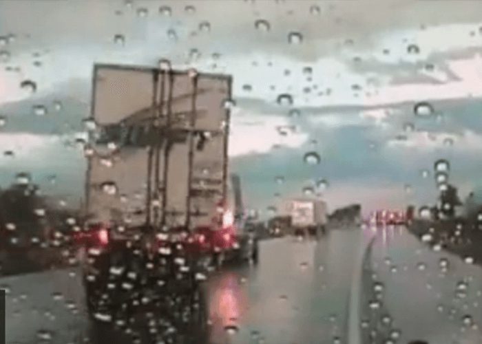 VIDEO: Jackknifed Truck Sideswipes State Trooper