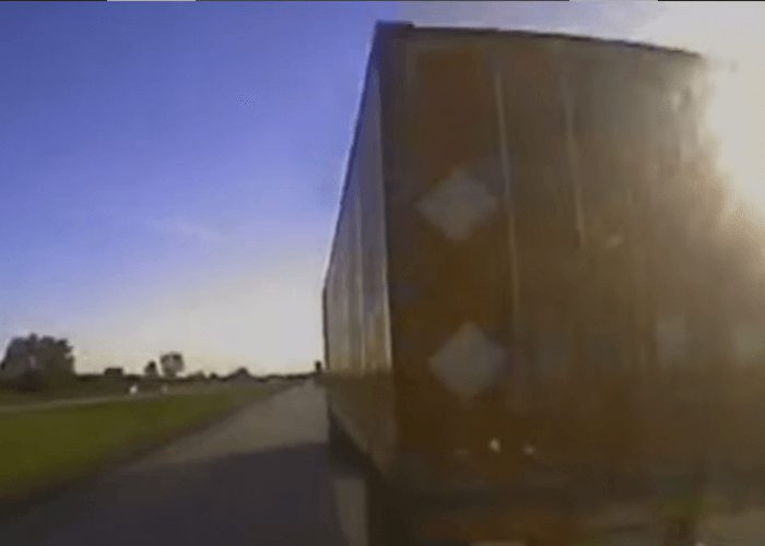 VIDEO: Man Falls Asleep In Stolen Ambulance, Rolls It Trying To Avoid Truck
