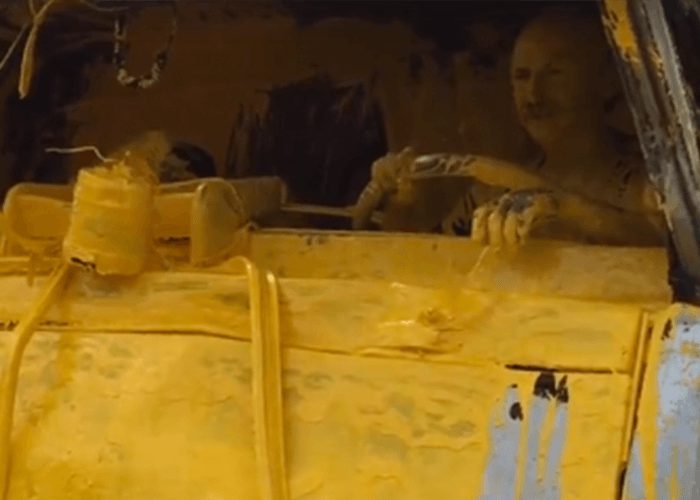 VIDEO: Truck Driver Coated In Yellow Paint After Crash