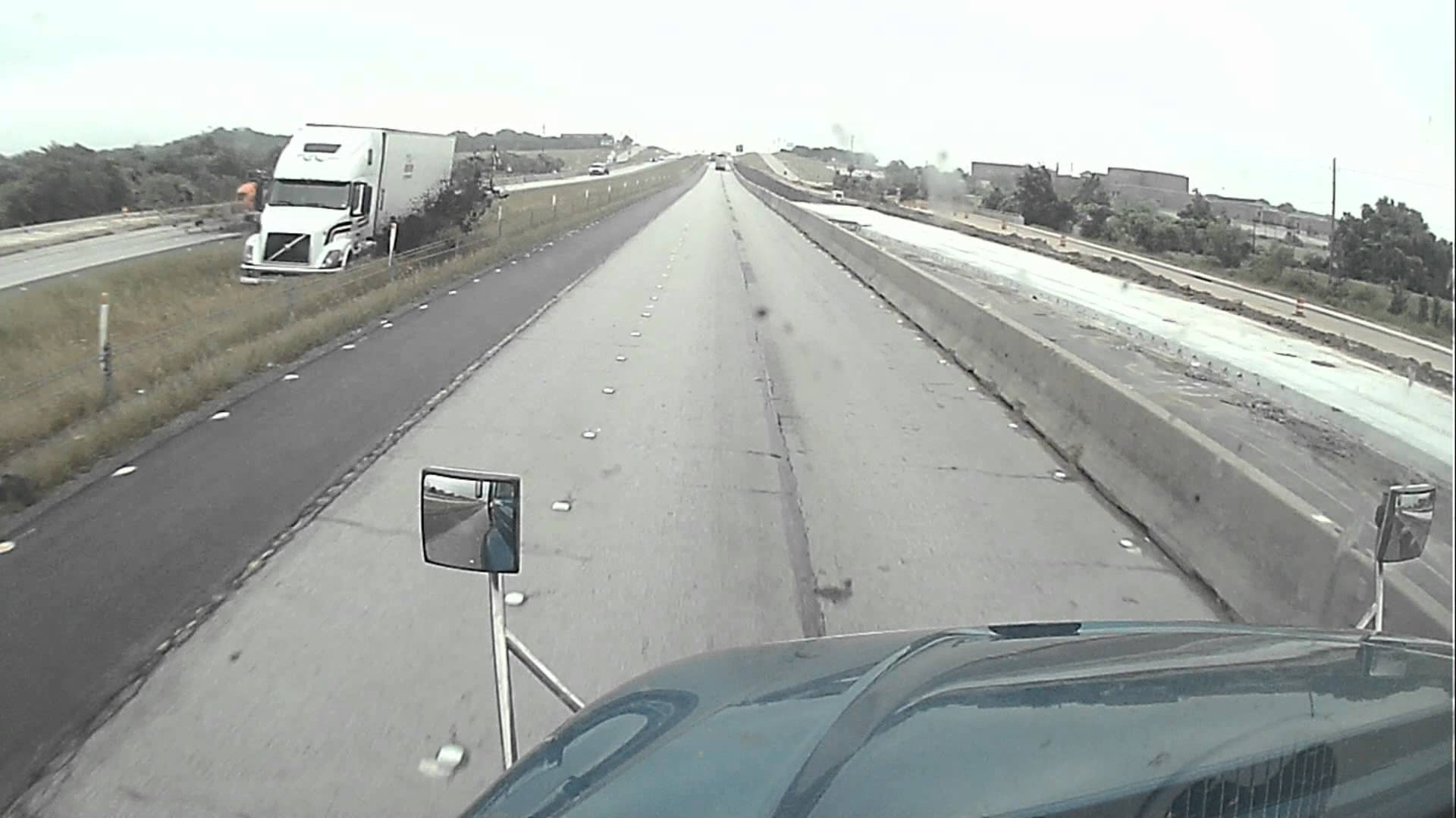 VIDEO: Out Of Control Truck Breaks Another Big Rig’s Windshield With Mud