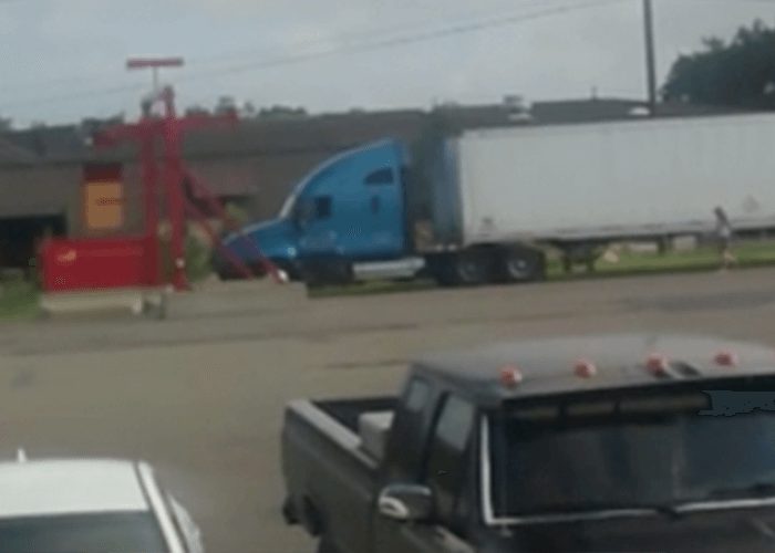 VIDEO: Angry Woman Attacks Truck