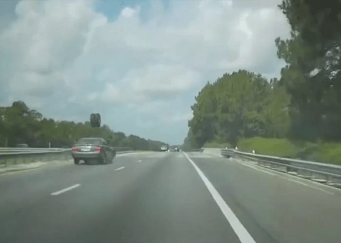 VIDEO: Loose Truck Tires Smash Into Oncoming Car