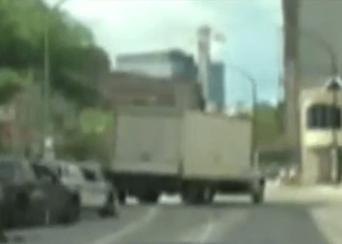 VIDEO: Box Truck Rams Police Cruiser, Leads Cops On Chase