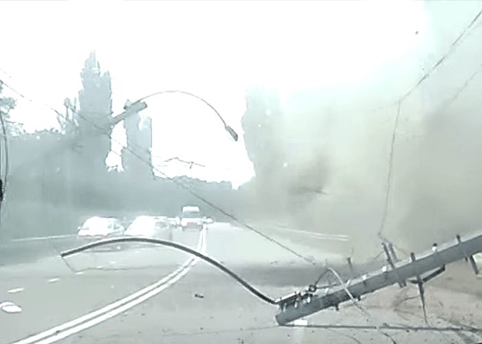 VIDEO: Truck Carrying Tank Flips, Takes Down Power Lines