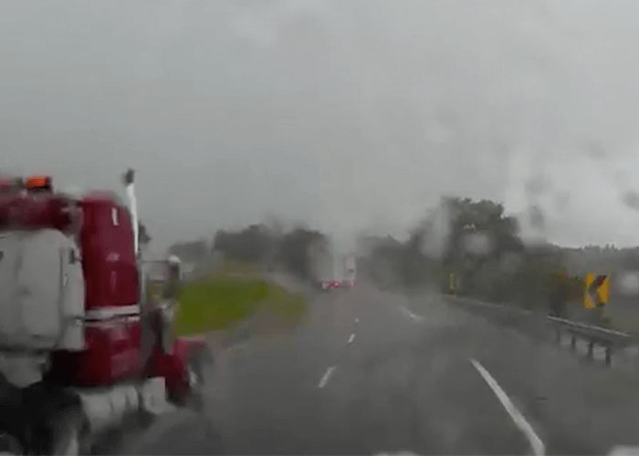 VIDEO: Truck Jackknifes In Rain